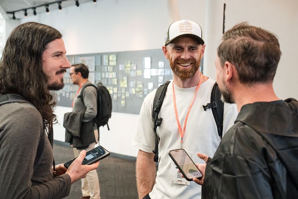Attendees chatting between sessions at AgentCon San Francisco