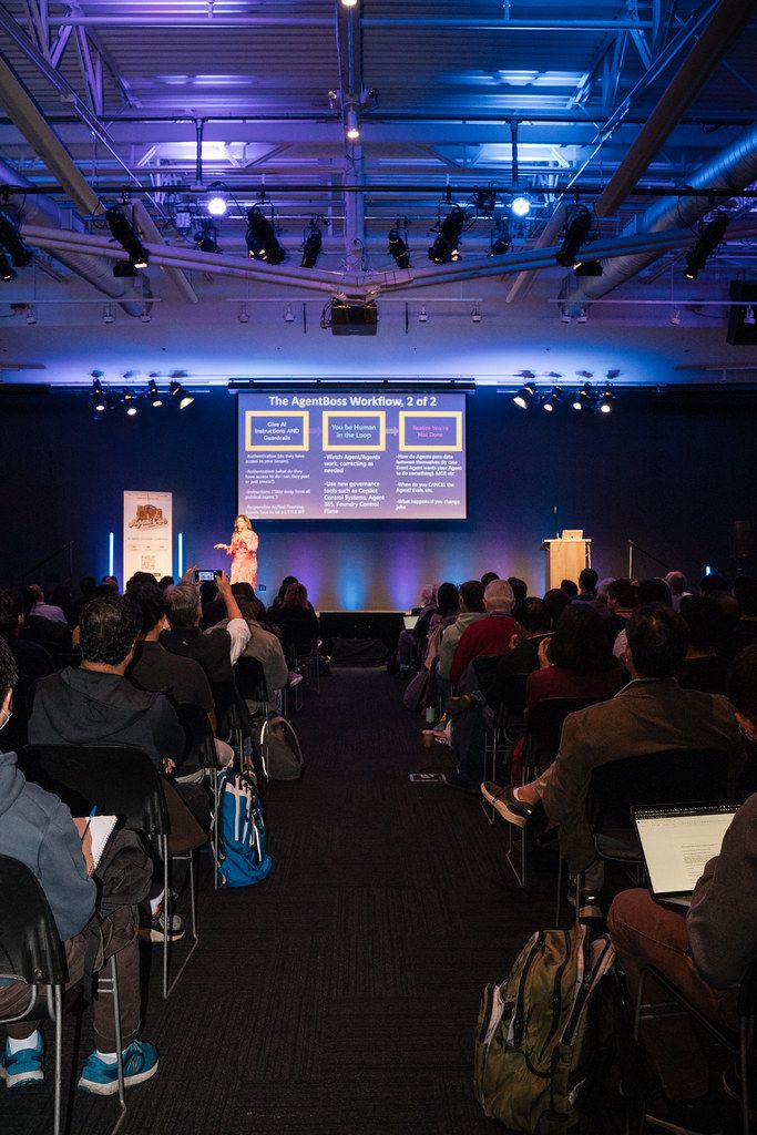 A speaker on the main stage at AgentCon San Francisco